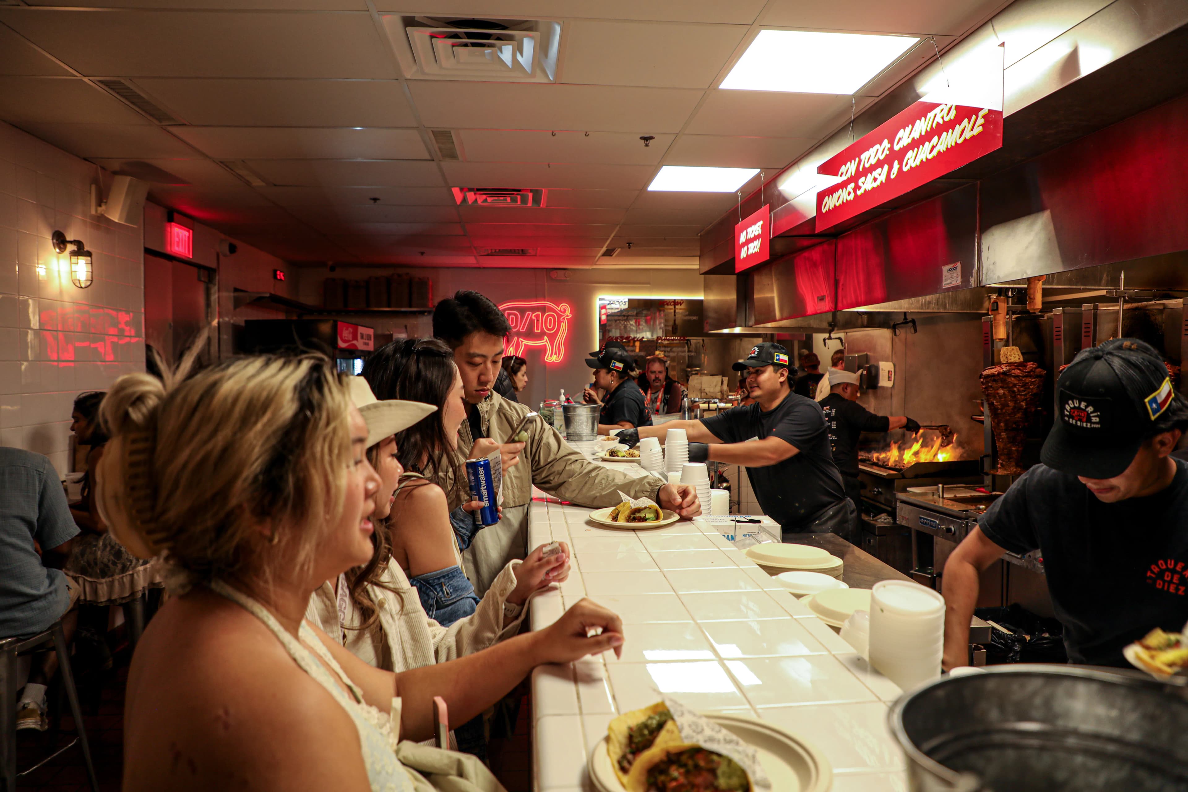 Trompo-style al pastor cooking on vertical spit